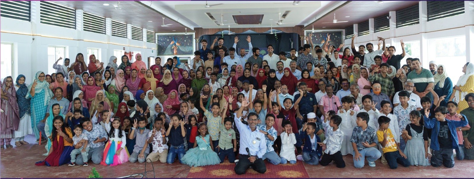 HalaCap staff and family group photo